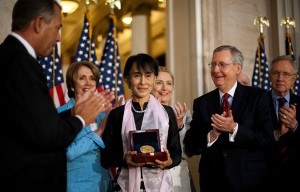 US honors Suu Kyi, ends sanctions on Myanmar Leaders