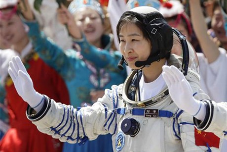 China sends first woman into space